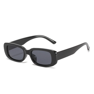 Retro rectangle sunglasses for kids featuring a polished black frame and dark lenses