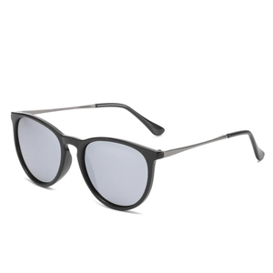 Polarized retro round sunglasses with black frames and metallic temples at 45 degree angle