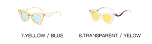 Détails de lunettes de soleil œil-de-chat vintage avec montures ambre et jaune