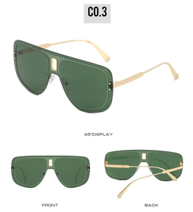 Détails de lunettes de soleil oversize à verres vert foncé avec monture dorée et rivets
