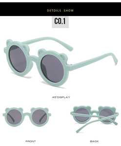 Detailed views of mint green bear ear round sunglasses for children with matte finish