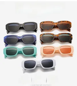 Flat lay of retro square sunglasses collection in seven diverse glossy resin colors