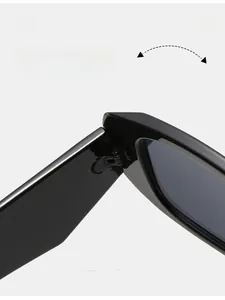 Detail of durable texture hinge on black square sunglasses with reinforced metal structure