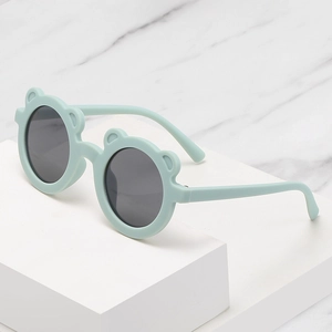 Mint green bear ear round kids sunglasses with dark grey lenses and matte finish