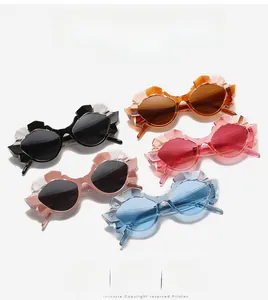 Flat lay of geometric cat eye sunglasses in multiple colors showing 3D faceted frames