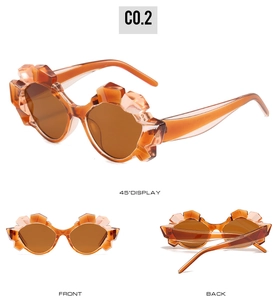 Detailed three-view shots of amber polygon sunglasses with sharp multifaceted geometric edges