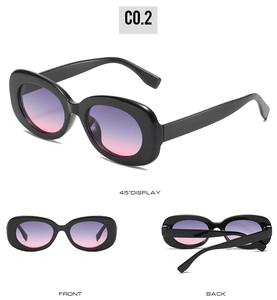 Detailed views of retro oval sunglasses with thick black frames and purple gradient lenses