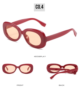 Multiple views of retro oval sunglasses with red thick frames and orange lenses