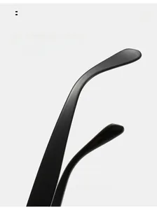 Detail of curved ergonomic sunglasses arms with matte black finish for comfort