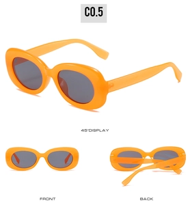 Retro oval orange sunglasses with dark grey lenses in multiple viewing angles