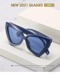 Macro shot of stylish blue triangular sunglasses with wide temples and high-quality CE markings