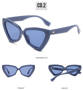 Front and back views of triangle cat-eye sunglasses with dark blue frames and gold accents