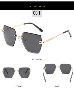 Detail of rimless square sunglasses with gold metal hinges and dark grey lenses