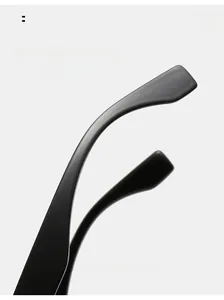 Close-up of matte black curved sunglasses temples with ergonomic arc design for comfort