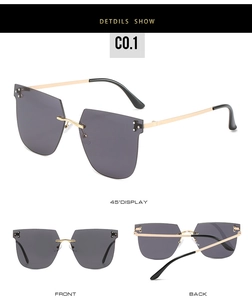 Détails de lunettes de soleil carrées sans monture avec verres dégradés et tiges dorées