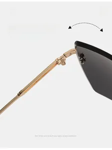 Detail of durable texture hinge on gold metal frame square rimless sunglasses