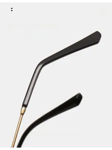Detail of ergonomic curved metal temple legs on stylish square frame sunglasses