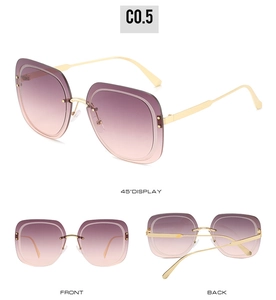 Detail view of square rimless sunglasses with purple gradient lenses and gold metal frames