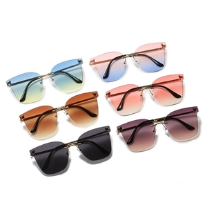 Set of six rimless gradient sunglasses with gold metal bridges and oversized lenses