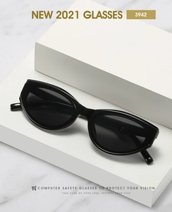 Close-up of black cat-eye glasses for screen protection on professional marble backdrop