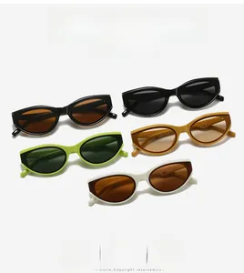 Detailed flat lay of cat eye sunglasses in various jelly colors and glossy frames