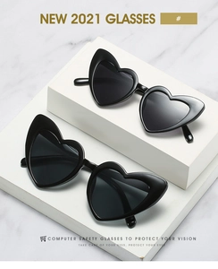 Close-up of heart-shaped cat-eye sunglasses on display for trendy fashion looks