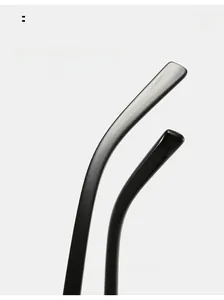 Detail of ergonomic curved glossy black temples for stable and comfortable eyewear fit