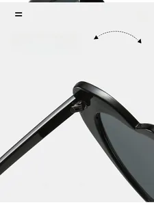 Detailed close-up of durable metal hinges on heart-shaped sunglasses for high quality