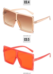 Detailansicht der quadratischen Übergroßen-Sonnenbrille in Bernstein und Orangerot