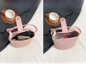 Detail showing the internal storage capacity of the pink PU leather crossbody bucket bag