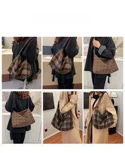 Hobo shoulder bag with classic plaid patterns and brown leather strap detail