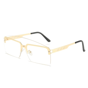 Modern oversized gold alloy glasses with transparent lenses and hollowed temple details