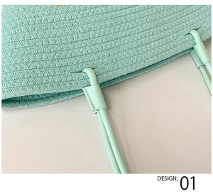 Detail of mint green hand-woven bag handle with premium texture and stitching