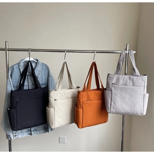 Minimalist large capacity tote bag collection in four colors with side pocket and zipper