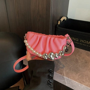 Pink pleated dumpling bag with decorative pearl and silver heart chain for women