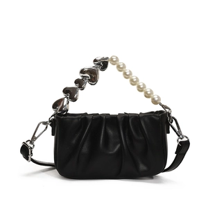 French pleated black handbag with silver heart metal and white pearl strap detailing