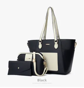 Three-piece black tote bag set showing textured PU leather and gold metal hardware