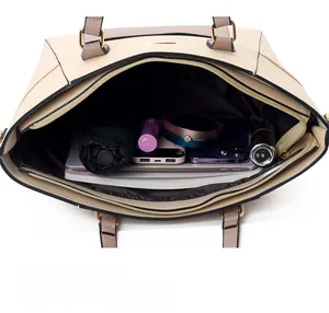 Spacious interior of beige tote bag showing large capacity for tablet and daily items