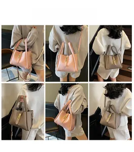 Litchi pattern bucket bag shown in pink and khaki with adjustable shoulder straps