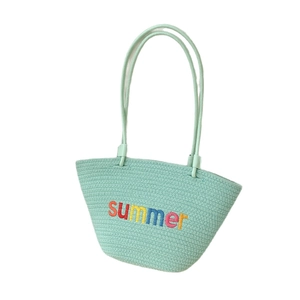 Handwoven mint green straw tote bag with summer embroidery for beach vacation fashion