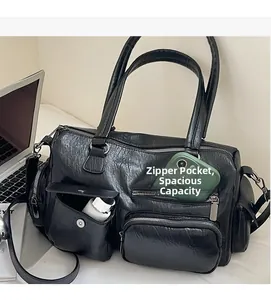 Détail du sac cabas en cuir PU noir avec poches zippées fonctionnelles et grande capacité