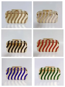Detailed grid showing luxury acrylic evening clutches with wavy rhinestone patterns in six colors