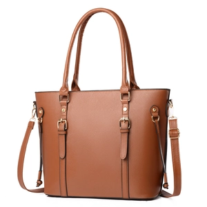 Brown large capacity tote bag with adjustable shoulder strap and gold hardware accents