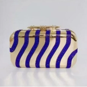 Chic acrylic evening clutch bag with blue rhinestone stripes and gold knuckle clasp