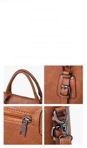 Détails du sac à main en cuir grainé marron avec fermetures éclair et ferrures métalliques
