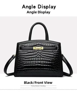 Front view of black crocodile pattern handbag with gold clasp and elegant handles