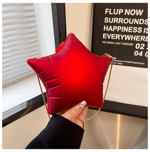 Chic red star-shaped acrylic bag featuring a matte puffed 3D texture and gold chain strap