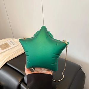 Handheld emerald green puffy star-shaped crossbody bag with elegant gold chain strap