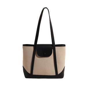 Sac cabas minimaliste en toile avec garniture en cuir noir et longues bandoulières de ville