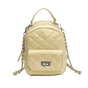 Chic quilted mini backpack in cream yellow PU leather with silver metal hardware chain straps